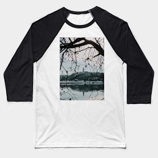 Branches of trees in front of church tower with river bank. Baseball T-Shirt